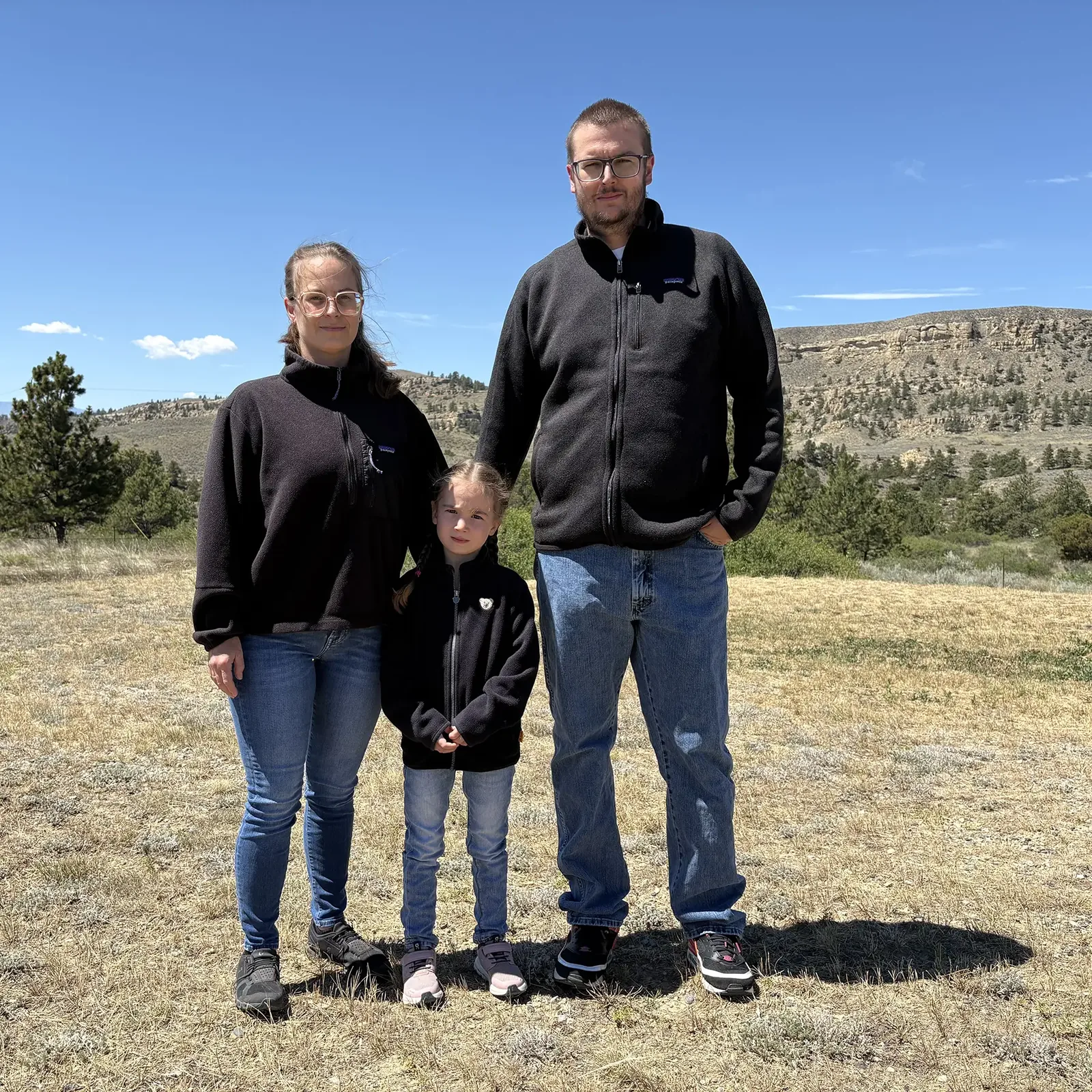 Nadine, Philippe, and Katelynn, the family behind Paws 'N' Stripes K9 Services in Fromberg, Montana